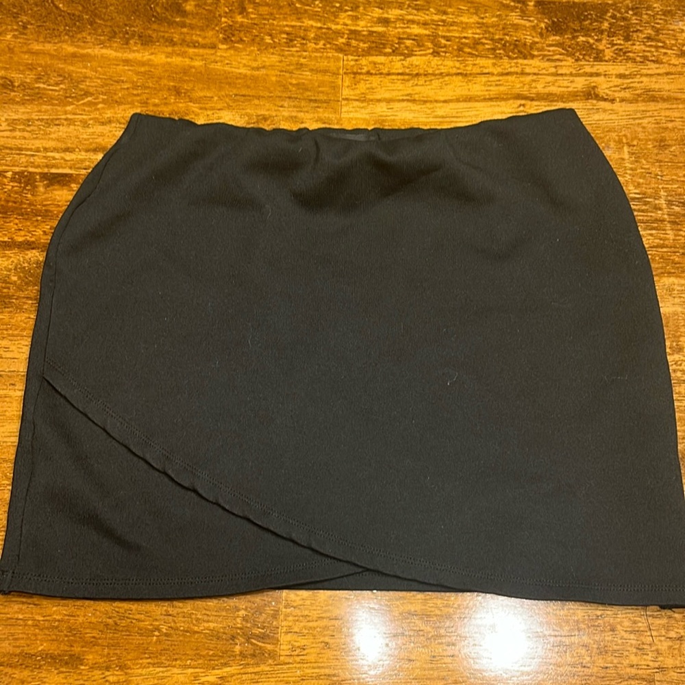 Kendall and Kylie Black mini skirt with slight wrap detail in front